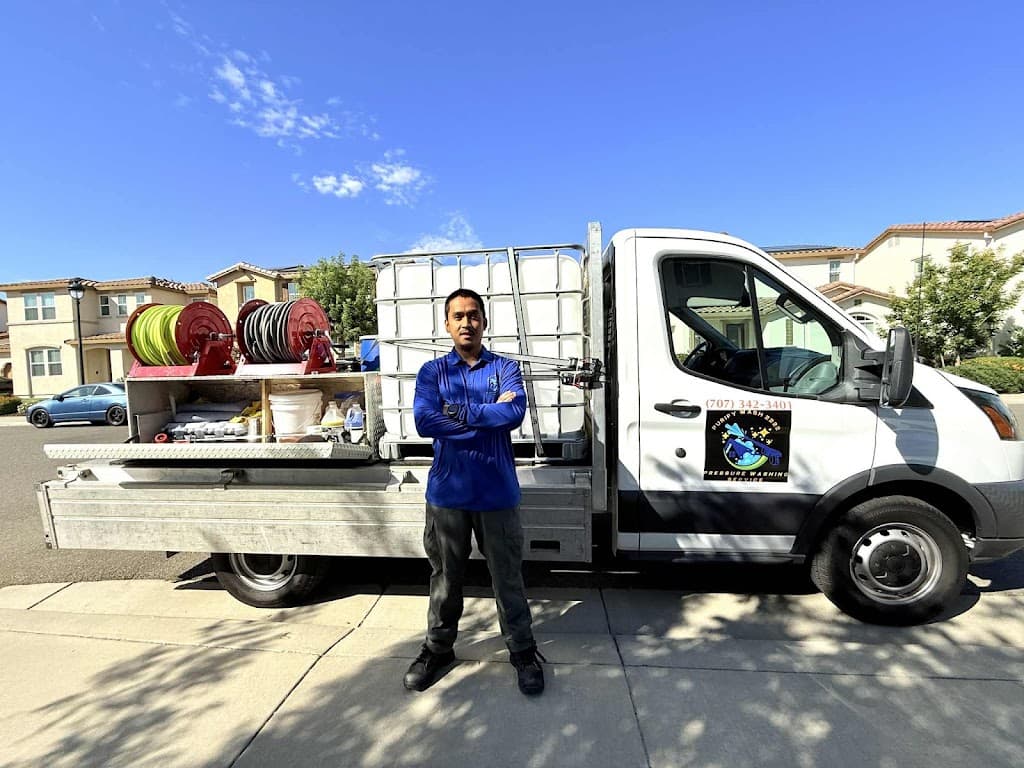 Purify Wash 2222 technician standing beside a fully equipped service truck